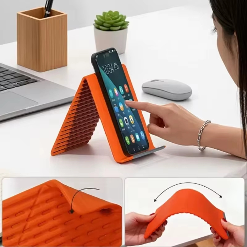Laptop Stand - ที่วางโทรศัพท์ซิลิโคนแบบพับได้ ปรับมุมได้หลายระดับ ยืดหยุ่น พกพาสะดวก ใช้เป็นขาตั้งบนโต๊ะสำหรับแล็ปท็อปและแท็บเล็ต -